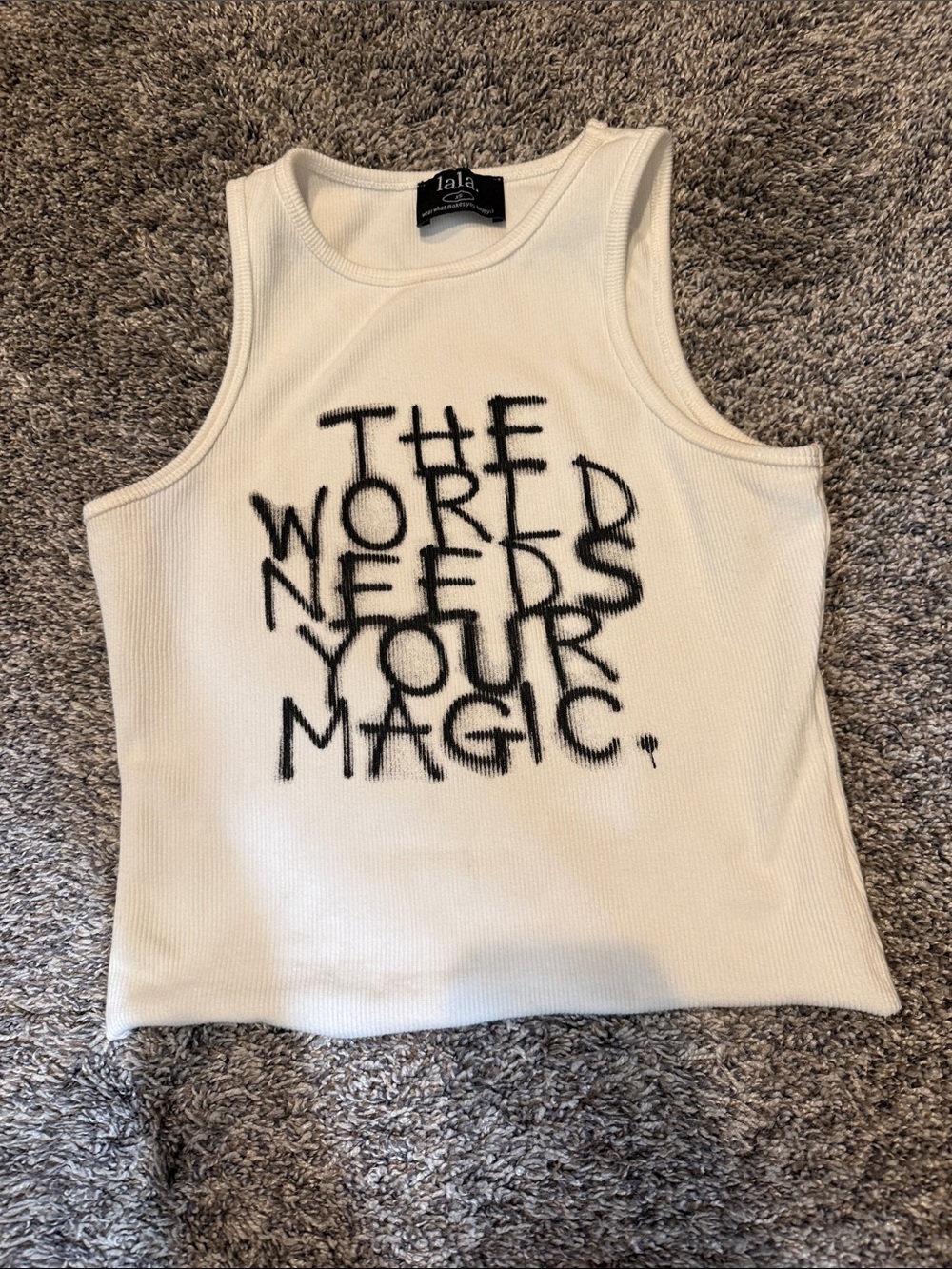 Dressed in LALA White Crop Tank with Black Graffiti Text